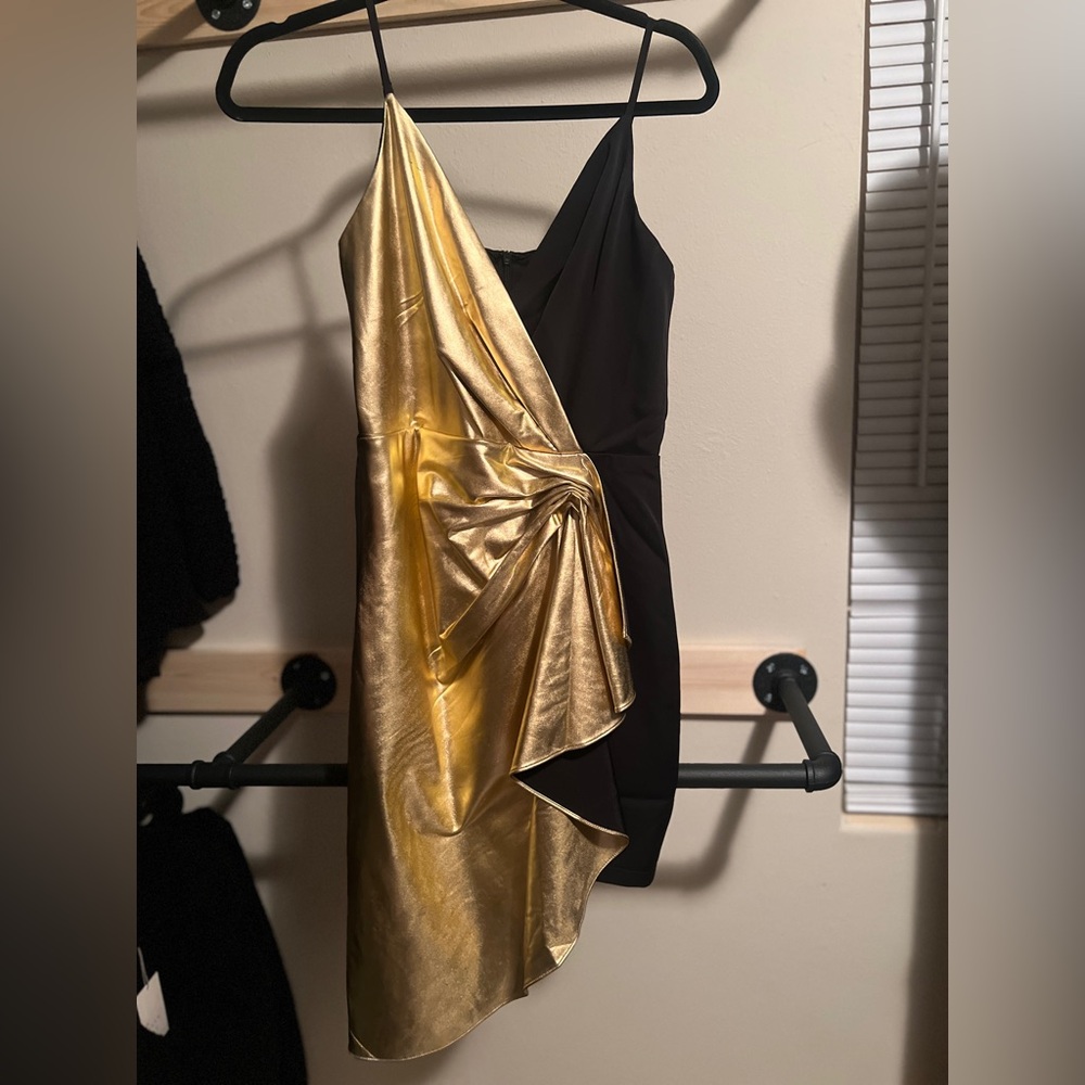 Lucy Paris gold and black cocktail dress. New with tags. Size small.